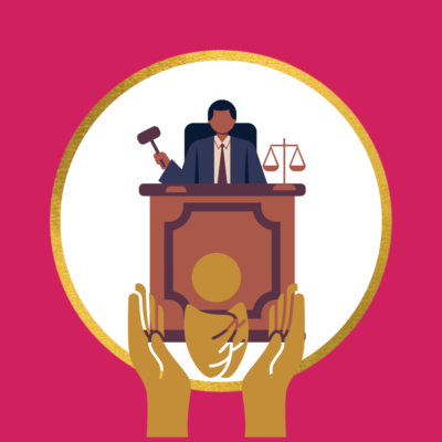 sitting judge with baby held by hands in front of him